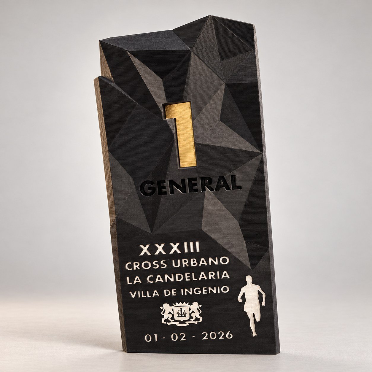 Trofeo impreso en 3D de primer puesto general del XXXIII Cross Urbano La Candelaria Villa de Ingenio, en negro con el número 1 en dorado